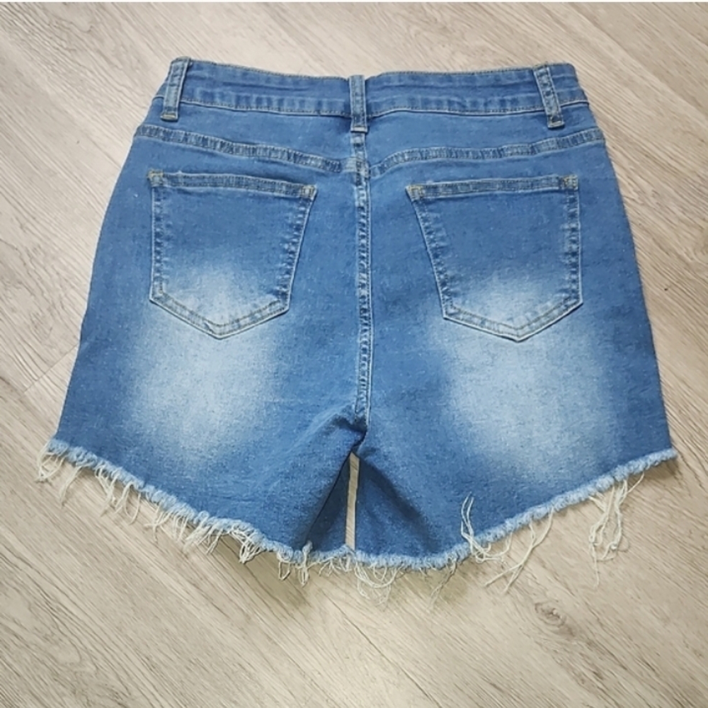 High-Rise Distressed Women's Jean Shorts in Blue - Picture 3 of 5